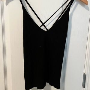 Black ribbed tank top. Cross cross back. Size small. Never worn.